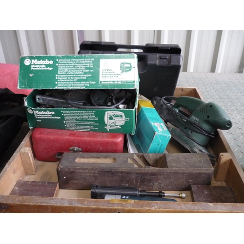 11 - Wooden drawer containing various tools including Metabo jigsaw drill, heater gun, etc