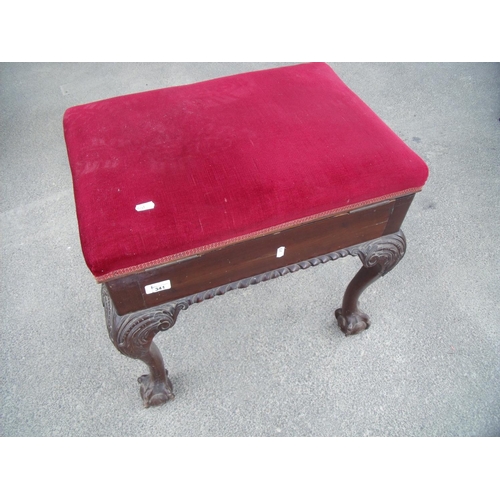 283 - Quality rectangular mahogany piano stool with lift-up upholstered top, on ball and claw feet