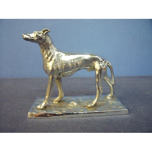 165 - Chrome figure of a greyhound/lurcher type dog on rectangular base (height 11cm)
