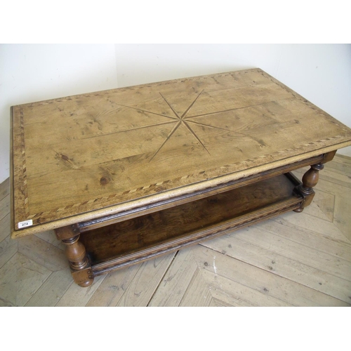 274 - Superb quality rectangular two tier oak coffee table with inlaid border and central star pattern on ... 