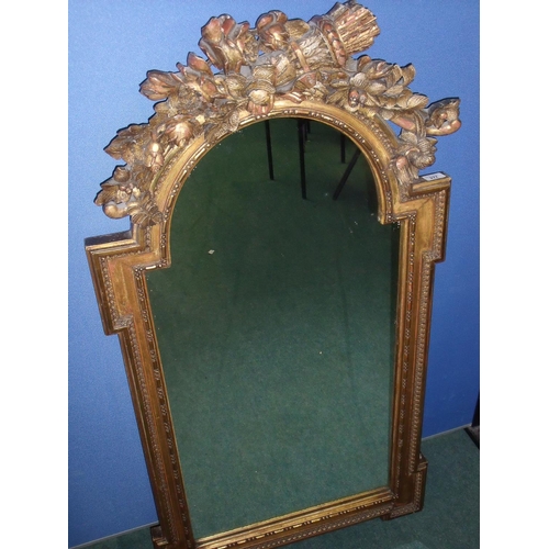 277 - Elaborate gilt framed archtop rectangular wall mirror (64cm x 120cm)