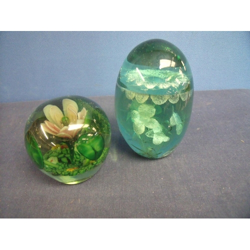 29 - Victorian green glass floral pattern dump (height 12cm) and another similar glass dump (2)