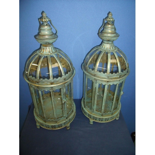 87 - Pair of large modern metal and glazed circular floor lanterns, with carry handles (height 60cm)