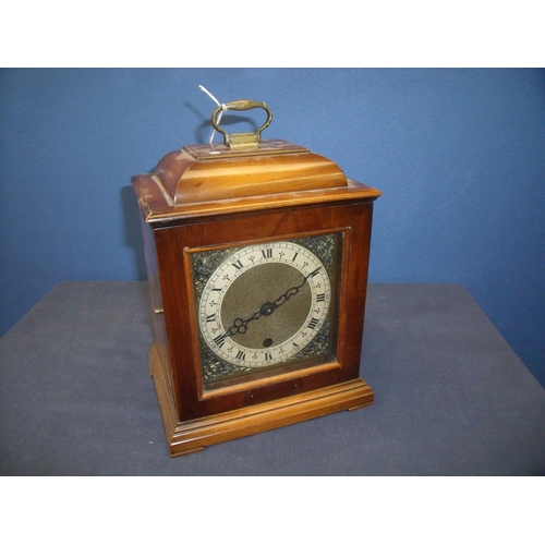 107 - 20th C mahogany cased bracket clock in the 18th C style, matted brass centre dial, silvered chapter ... 