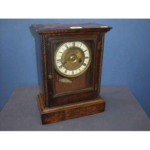 113 - Late 19th C continental oak cased striking mantel clock with rope twist columns
