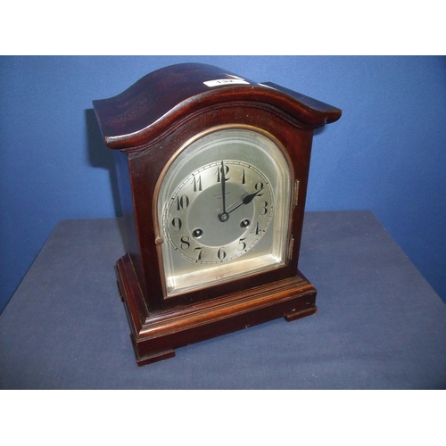 132 - Early 20th C Junghans mahogany cased striking mantel clock, silver dial and chapter ring bearing ret... 
