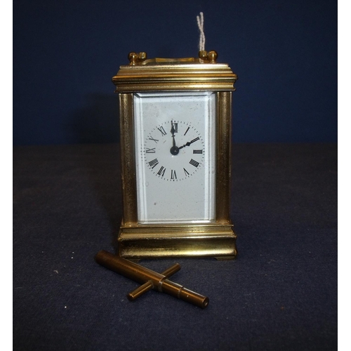 133 - Early 20th C miniature brass carriage clock, white enamel dial, platform escapement and movement sta... 