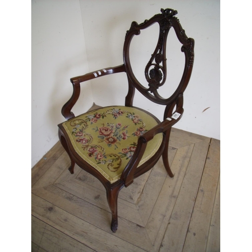 252 - French style 19th/20th C mahogany framed armchair with elaborately carved back and woolwork upholste... 