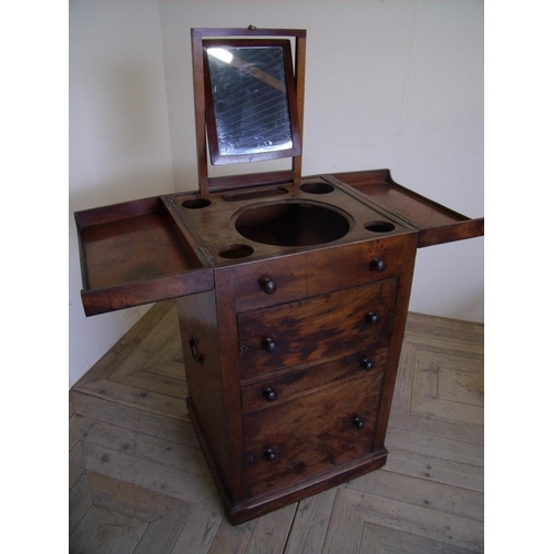 253 - 19th C mahogany Campaign washstand with twin hinged opening lever tops revealing fitted interior, wi... 