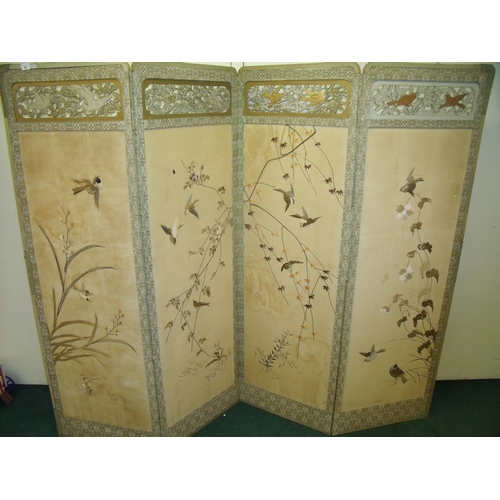 39 - Early - mid 20th C four sectional folding Oriental screen, with wooden framework and top carved fret... 