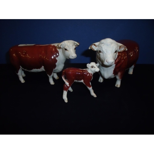 4 - Beswick Hereford cattle group comprising of Champions of Champions bull, cow and calf (3)