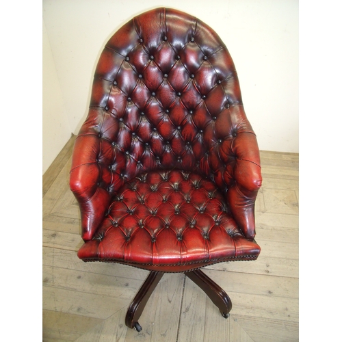 265 - Red leather Chesterfield style deep button backed office swivel chair