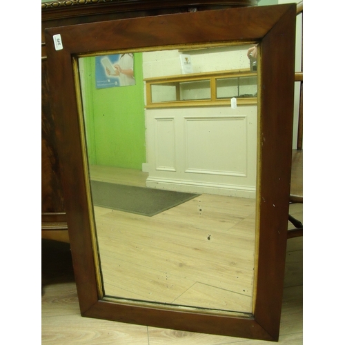 249 - 19th C rectangular mahogany framed wall mirror with gilt slip (61cm x 87cm)