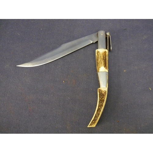 10 - Navaja style knife with 6 1/2 inch folding Inox blade stamped Santa Cruz, with antler grips