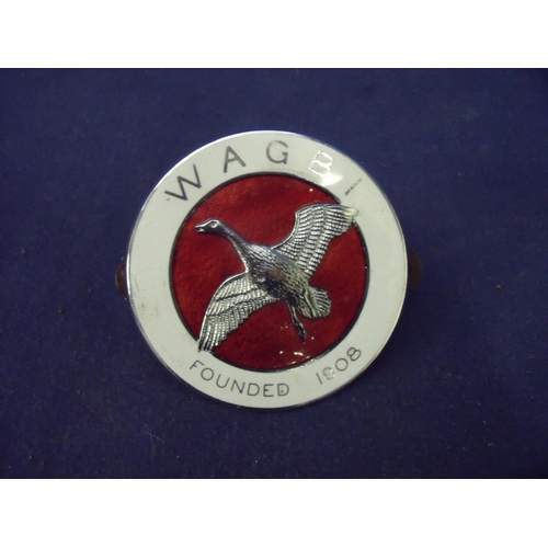 151 - Chrome and enamel Wagbi founded in 1908 car badge (diameter 7.5cm)