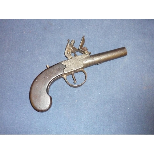 288 - Flintlock pocket pistol with 2 1/4 inch turn off barrel and top slide safety (makers name not visibl... 