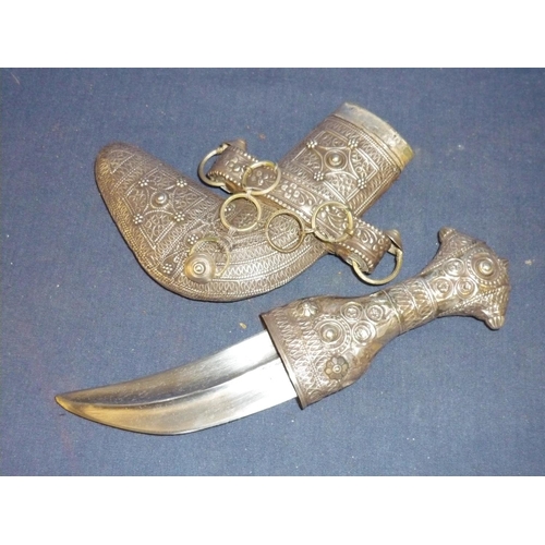 31 - Early 20th C Omani boys Jambiya/Khanjar, covered overall hilt and scabbard with sheet silver in very... 