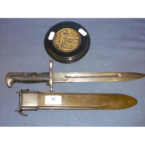 36 - Reproduction of an American WWII period M1 Garand Bayonet, and copy of British bronze WWI memorial p... 