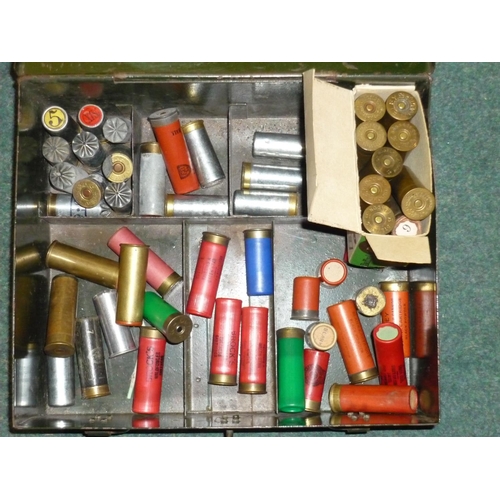 715 - Metal ammo box containing a selection of various 12 bore shotgun cartridges including aluminium case... 