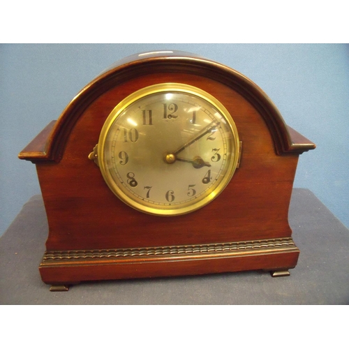 509 - Early 20th C mahogany cased arched top mantel clock with brass dial and chiming movement