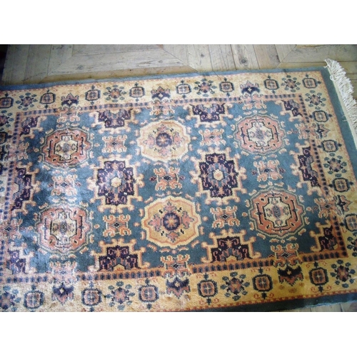 376 - Blue & cream ground Chinese style woollen rug (151cm x 94cm)