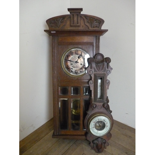 9 - Oak cased steel faced wall clock with bevelled edge glass panels and an oak cased barometer A/F (2)