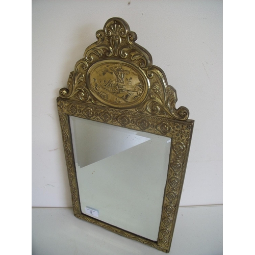 6 - Embossed brass framed bevelled edge wall mirror (28cm x 50cm)