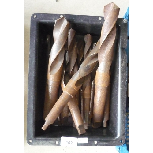 102 - Box containing a quantity of extremely large drill bits