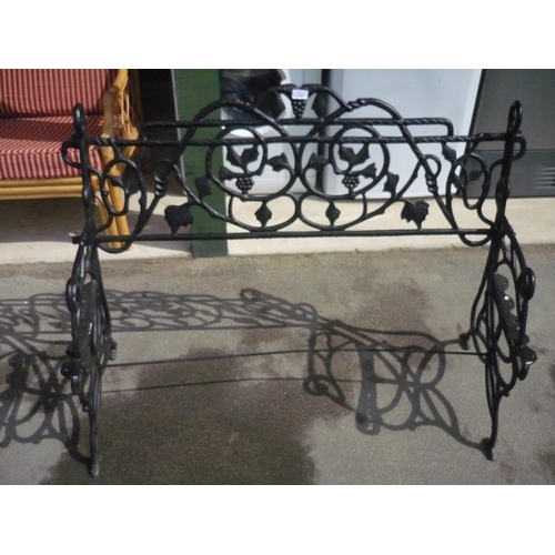 113 - Ornate wrought iron garden bench with grapes and leaf designed back