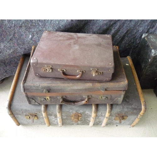 61 - Large travelling trunk with wood and metal strapping and brass locks, and two other vintage travelli... 