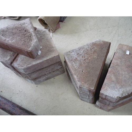 75 - Set of thirteen triangular garden edging stones