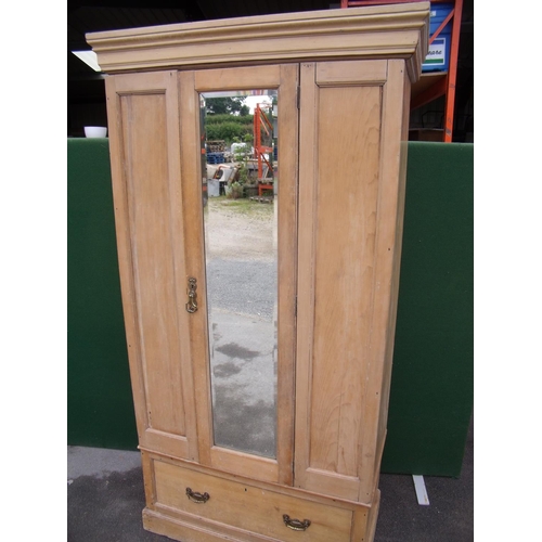 301 - Late Victorian waxed pine single mirror door wardrobe with drawer to base (101cm x 193cm x 51cm)