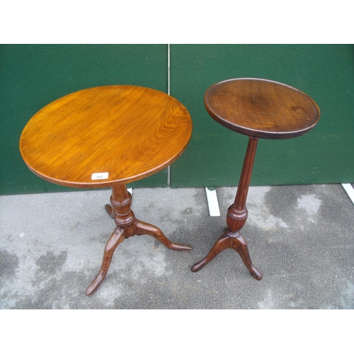 309 - Victorian oak and elm table with circular snap top and turned column on three splay legs terminating... 