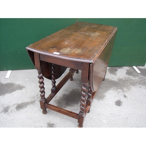 312 - Interwar period oak gate leg drop-leaf dining table on barley twist supports