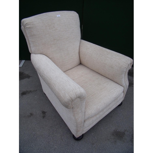 315 - Early 20th C upholstered armchair on bun supports