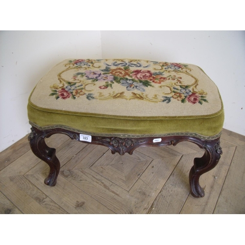 323 - Carved Victorian mahogany stool with upholstered needlework top, on carved French cabriole legs