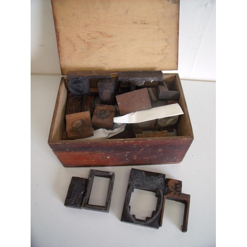 93 - 19th C stained pine box containing a large quantity of various wood and metal printing blocks and pl... 