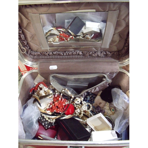 95 - Travel case containing a large selection of costume jewellery