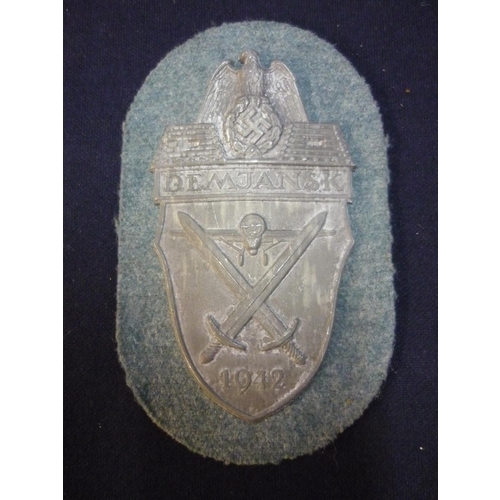 24 - German WWII Demjansk Shield Badge 1942