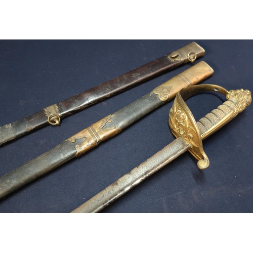 68 - 19th C Royal Navy Officers Dress Sword with 29 1/2inch pipe back blade with double pointed edge and ... 