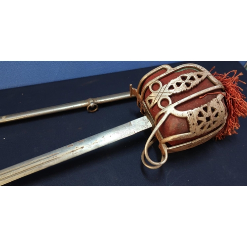 76 - Good quality copy of a Scottish Victorian Officers Broad Sword with basket hilt, complete with steel... 