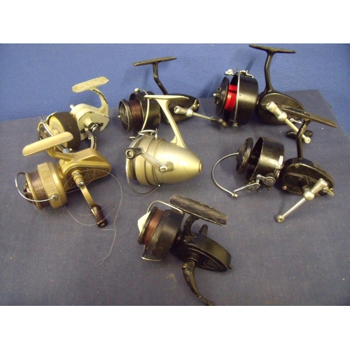 308 - Collection of seven vintage spinning reels including J.W. Young & Sons Ambidex casting reel, Mitchel... 