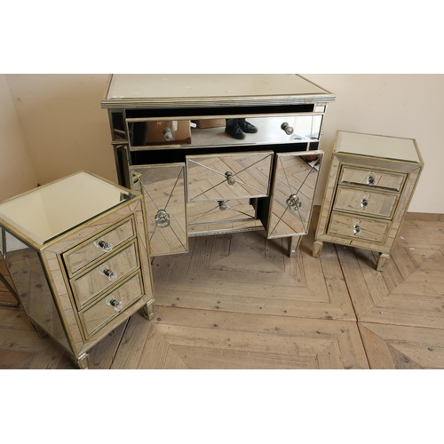 32 - Mirror finished bedroom style chest of one long above of two short drawers flanked by slide out comp... 