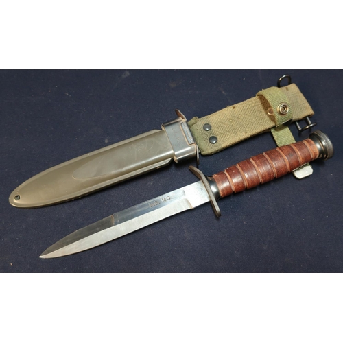 166 - US M3 combat knife with 6 1/4 inch blade with part double edge stamped US M3 with shaped crosspiece ... 