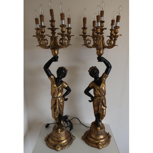 117 - Pair of composite Blackamoor type candelabra with gilt detail, in the form of young ladies, with ele... 