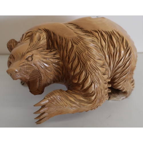 118 - Large carved wood figure of a bear (approx. 21cm high)