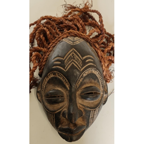95 - Carved African tribal style mask with hessian ropework hair
