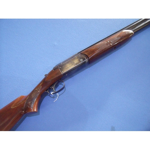 460 - Valmet 12 bore over & under shotgun with 25 3/4 inch barrels, single trigger, 14 1/4 inch stock, ser... 