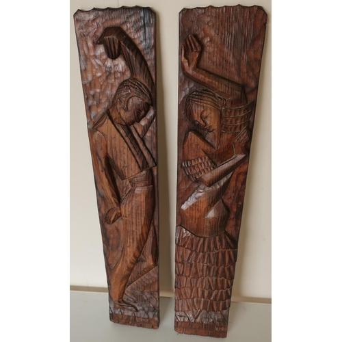 80 - Pair of carved wood wall panels signed Leggy depicting Spanish dancers (12cm x 61cm)