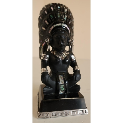 103 - Carved obsidian Mexican Taxco Aztec figurine inlaid with silver and Mother of Pearl (height 12cm)